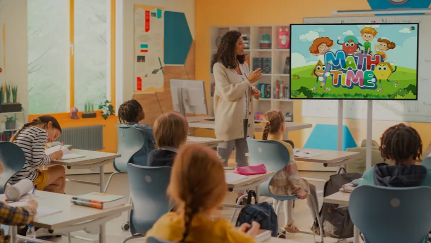 pilples are spending their math time with a smart whiteboard in the claasroom