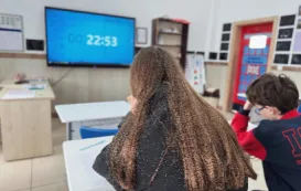 a classroom with bulletin board