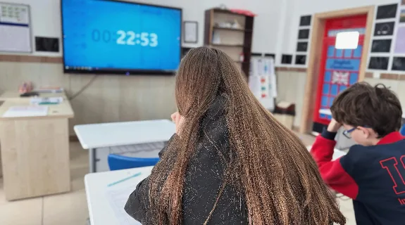 a classroom with bulletin board