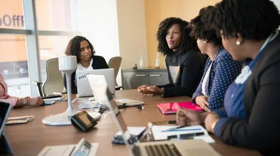 The employees gathered in the conference room for a meeting