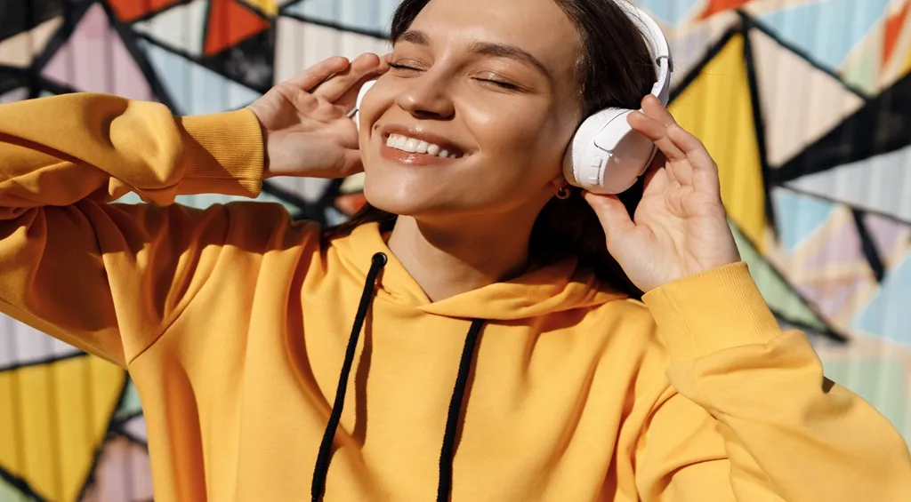 Woman enjoying clear and immersive audio with headphones