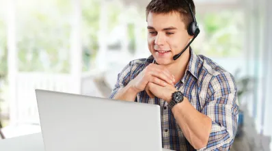 a-man-using-bluetooth-headset-with-mic-for-work