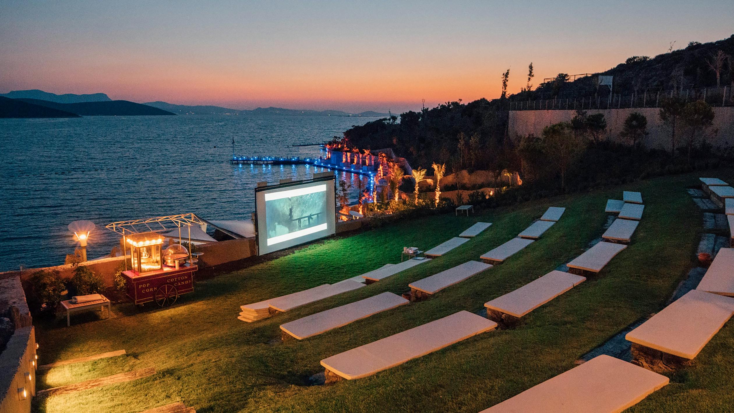 a projector near the sea and the view of sunset is gorgeous.jpeg