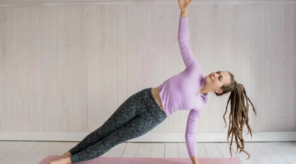 a women is doing pilates workout