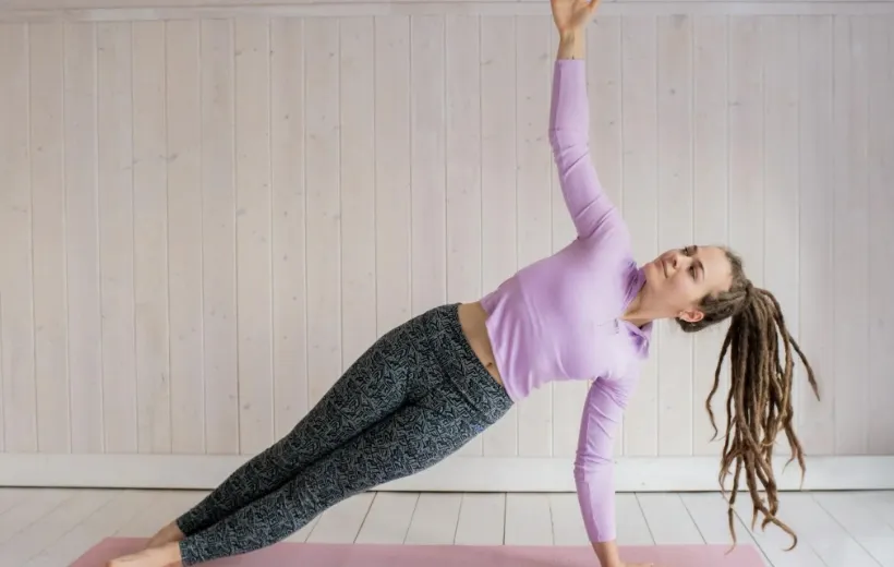 a women is doing pilates workout