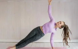 a women is doing pilates workout
