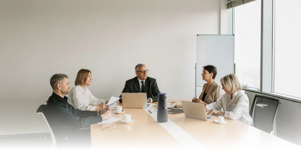 a group of people are having a meeting