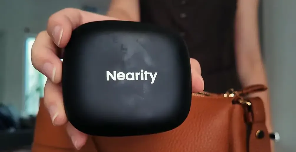 Callista showing her new earbuds