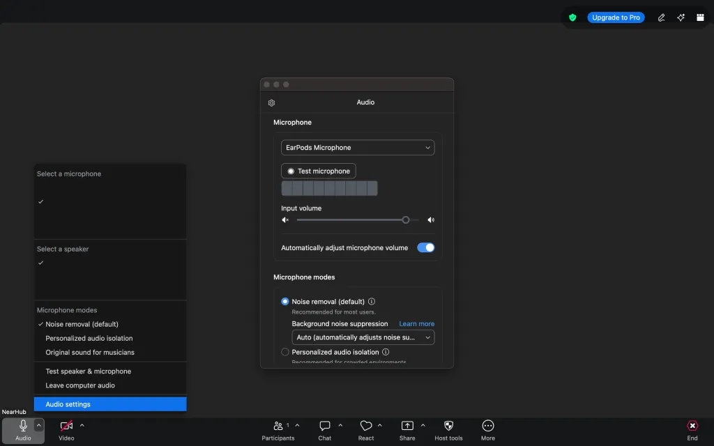 Zoom Workplace meeting screen showing audio settings for adjusting microphone input volume during a video call.