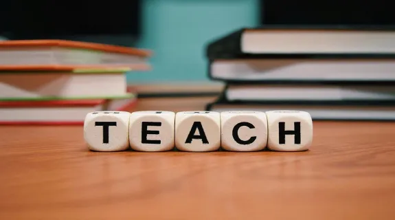 A school administrator trys to choose the best whiteboard for her classroom