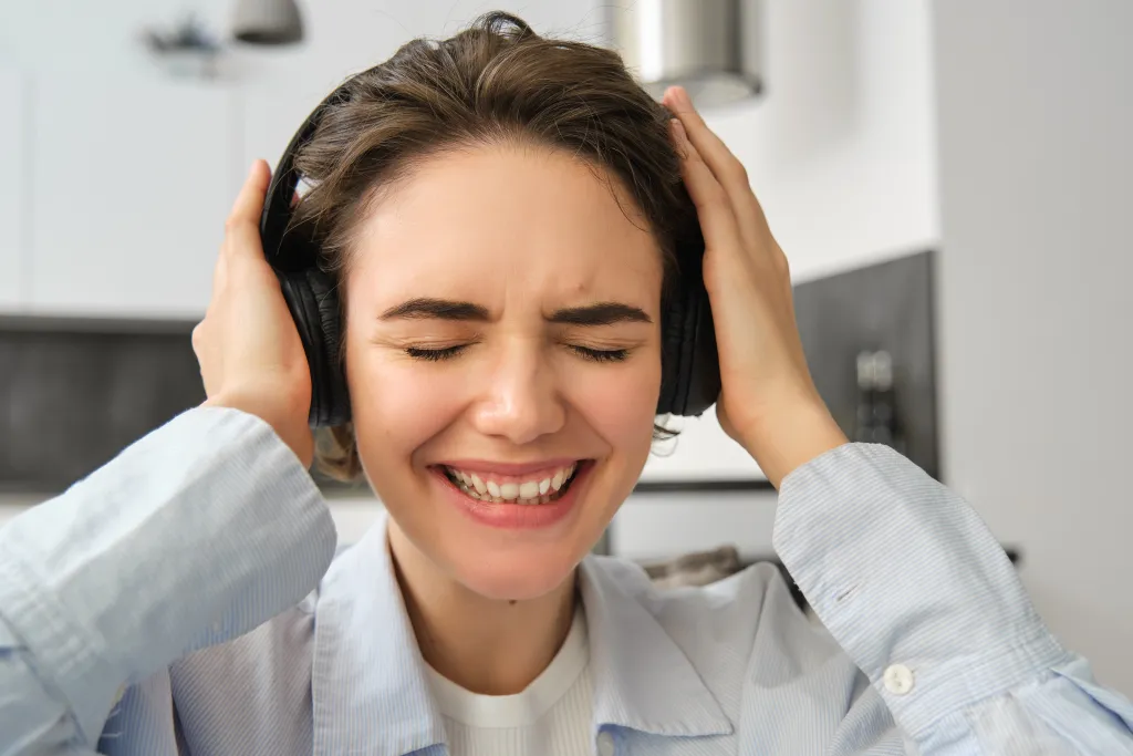 this female is crying because she is using best cheap headphones with noise cancelling