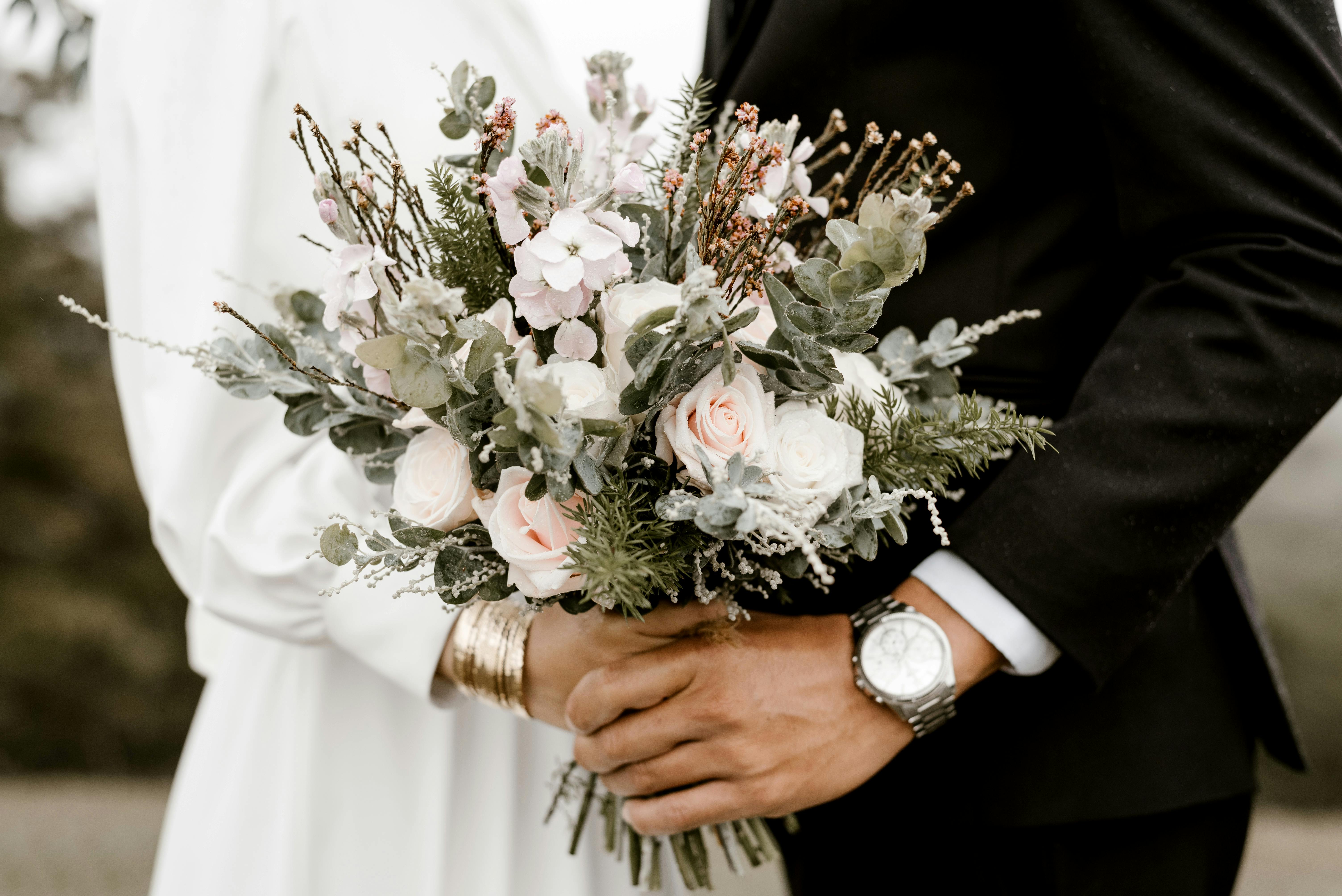 couple holding each other together at wedding