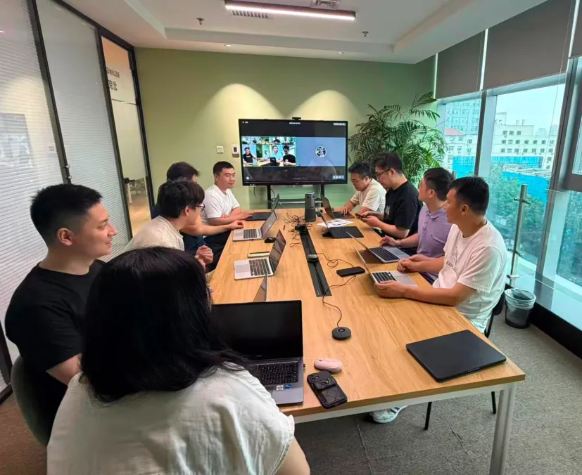 group team meeting with conference camera