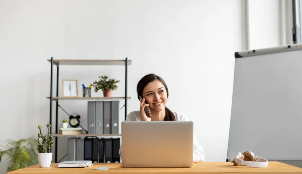 A woman is calling at home.