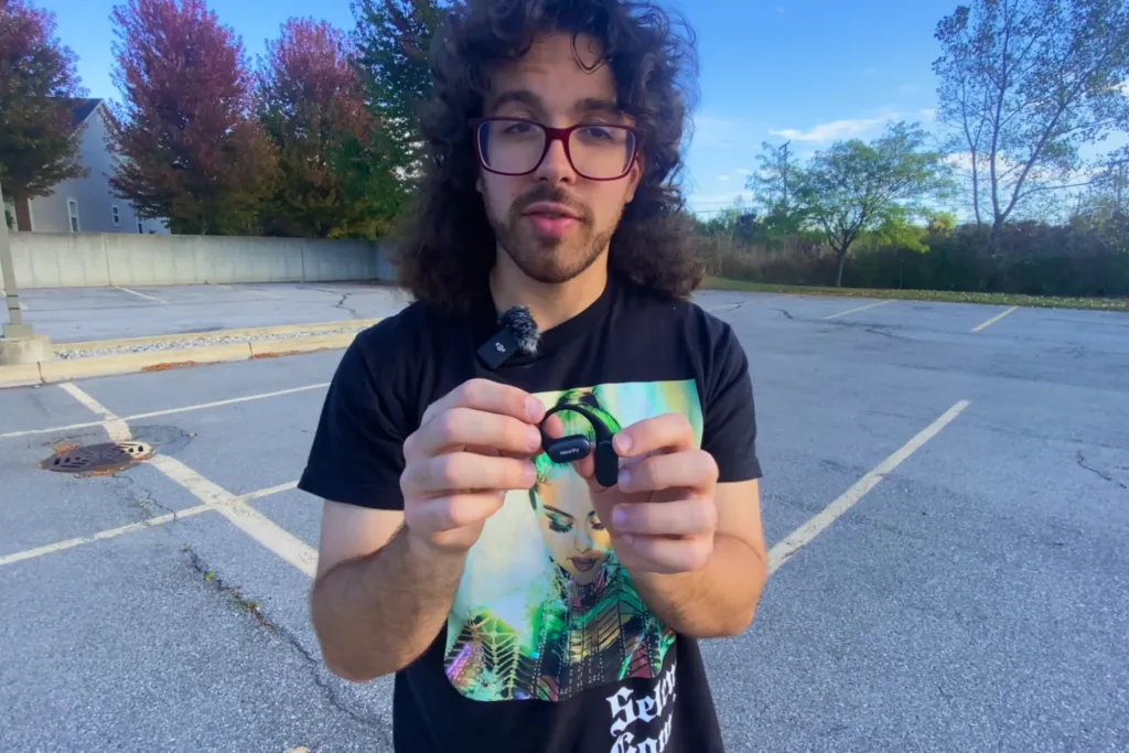 a runner is using best earbuds for call quality