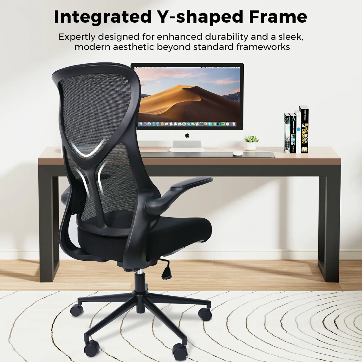 A black office chair for small people beside a desk