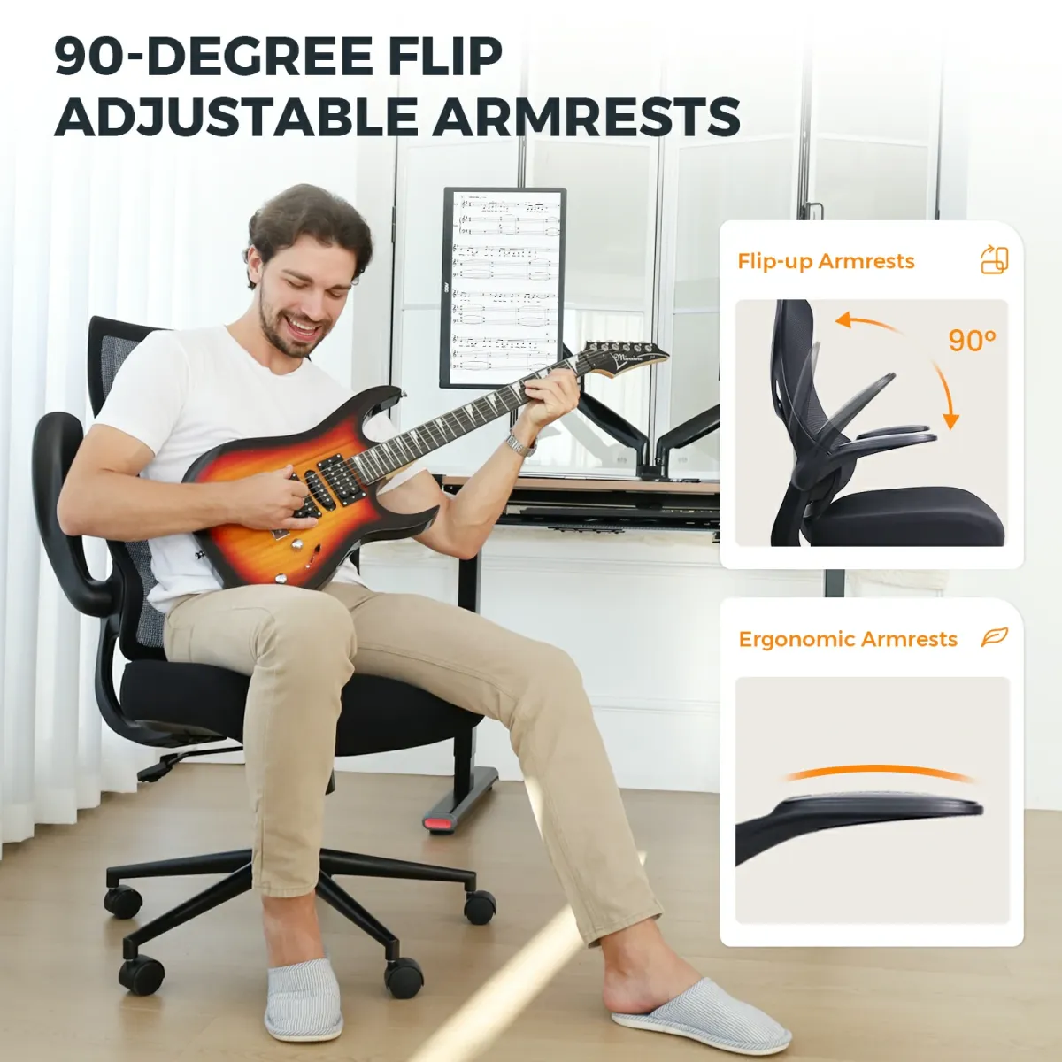 A man sits on a short desk chair
