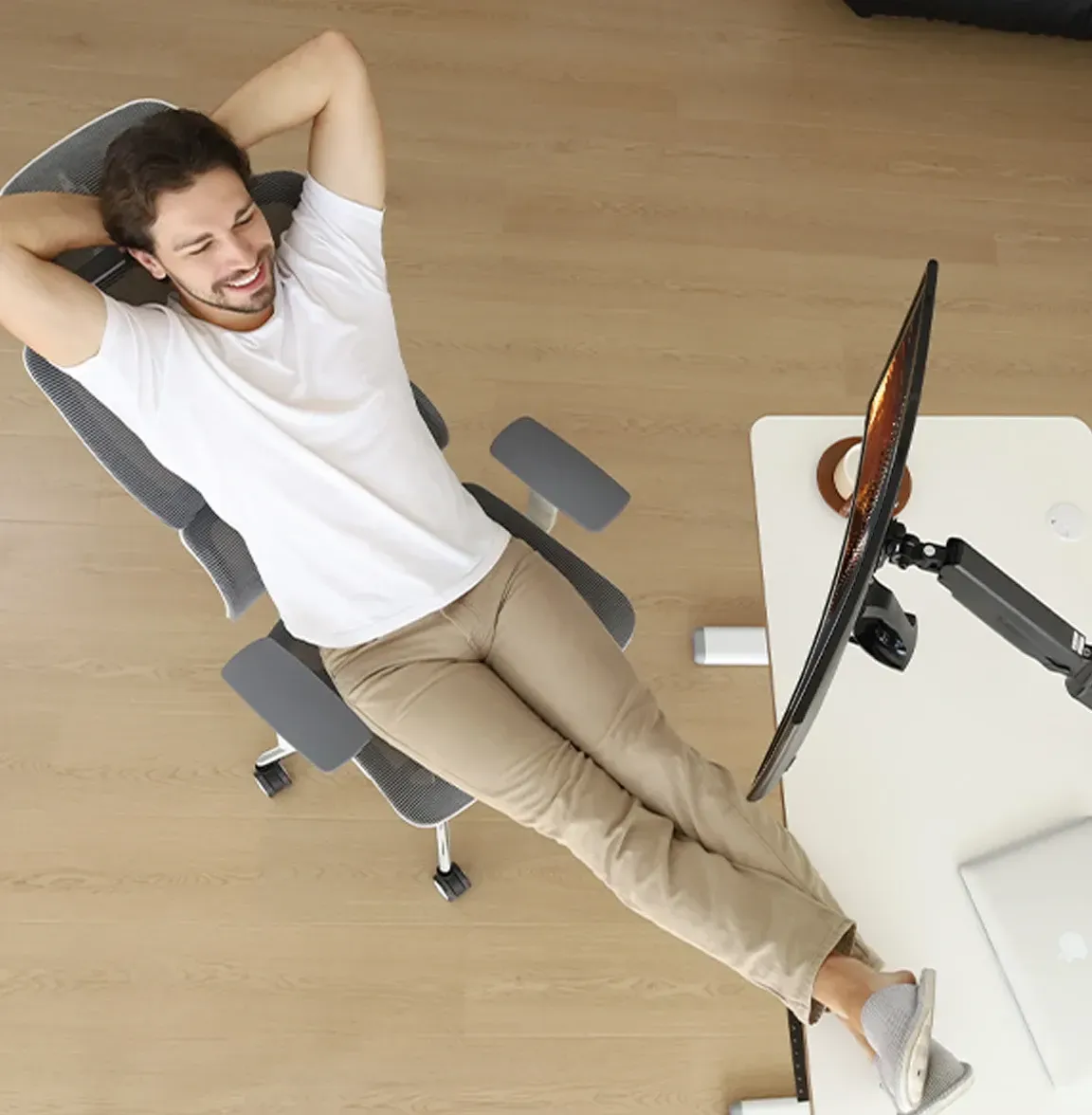 NearHub adjustable computer monitor stand in home office with a desk and a chair