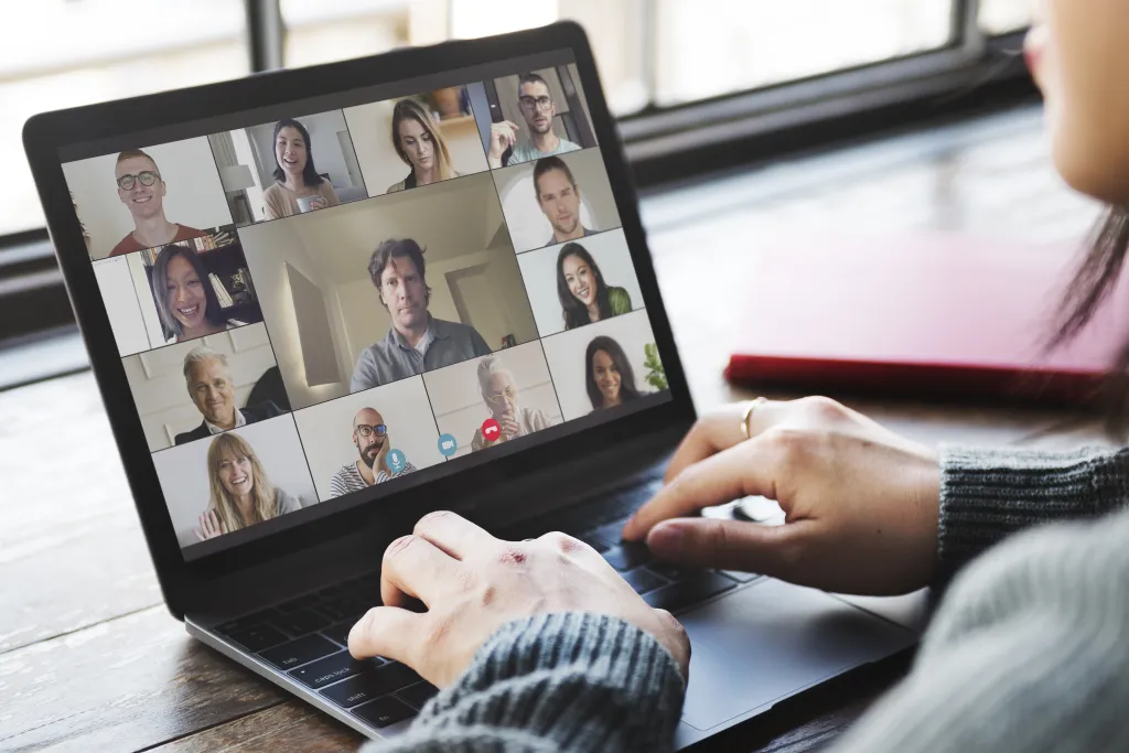 A woman attending a video conference at home