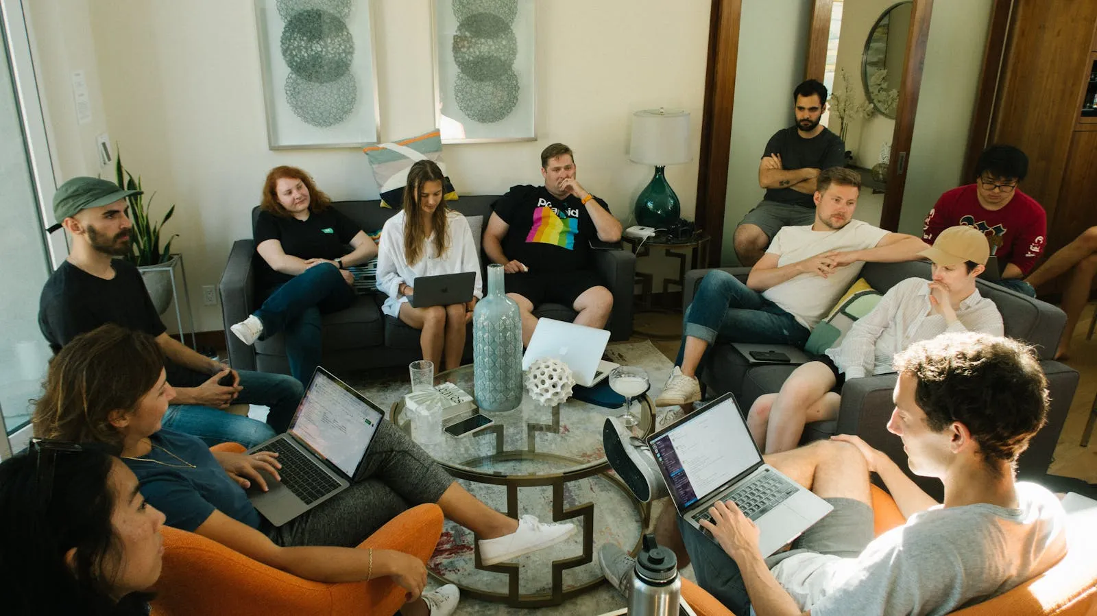 people meeting in a huddle room.jpeg