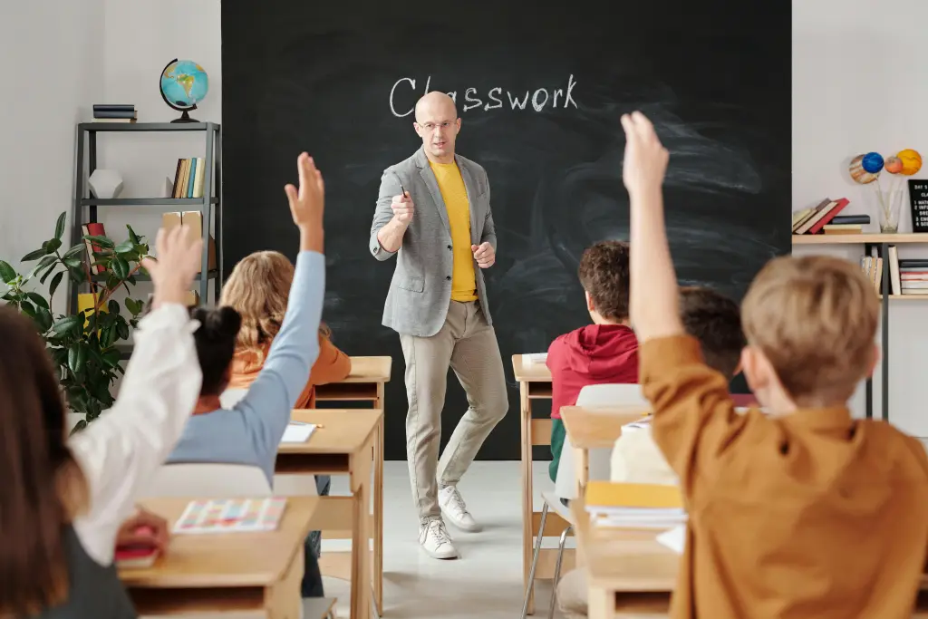 a teacher using ela bulletin boards