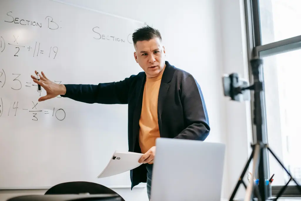 a teacher using blackboard for online tutoring