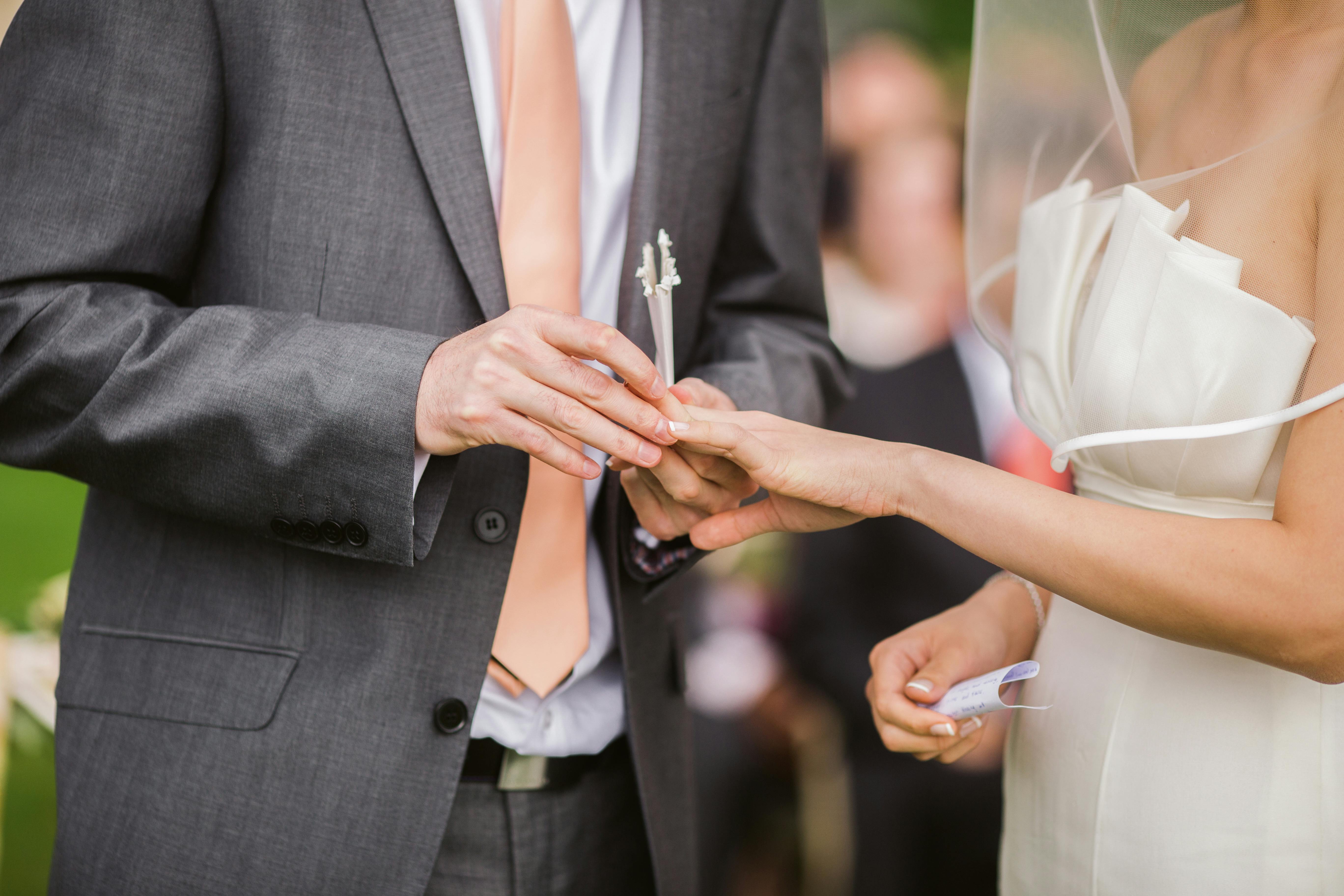 putting on ring with wedding music