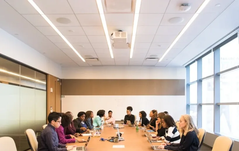 staff meeting in a conference room