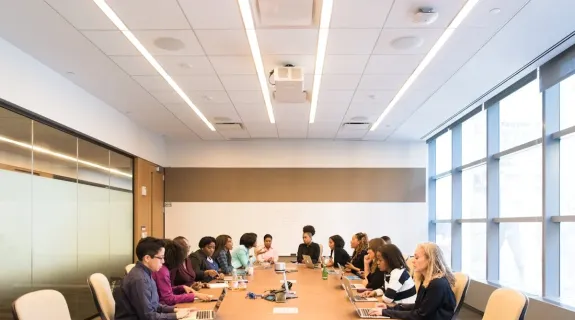 staff meeting in a conference room