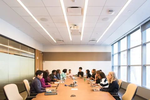 staff meeting in a conference room