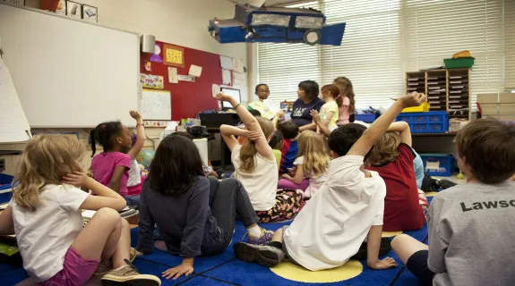 a teacher leading  educational whiteboard games