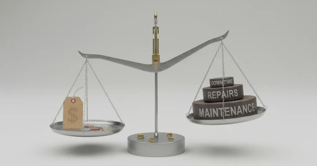balance scale concept showing low upfront price weighed against heavy hidden costs like maintenance, downtime, and repairs