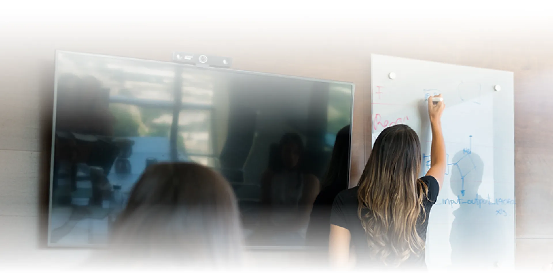 Several people in a conference room using NearHub board S pro smart whiteboard for office in a meeting
