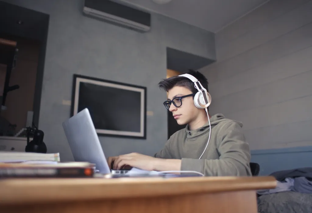 young-boy-vibe-coding-wearing-headset
