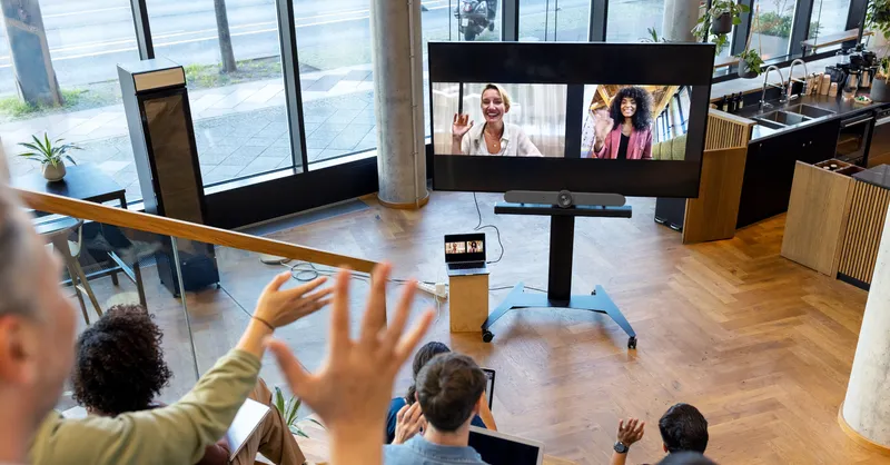 Figure 4: Video conference classroom showing remote participants on large display