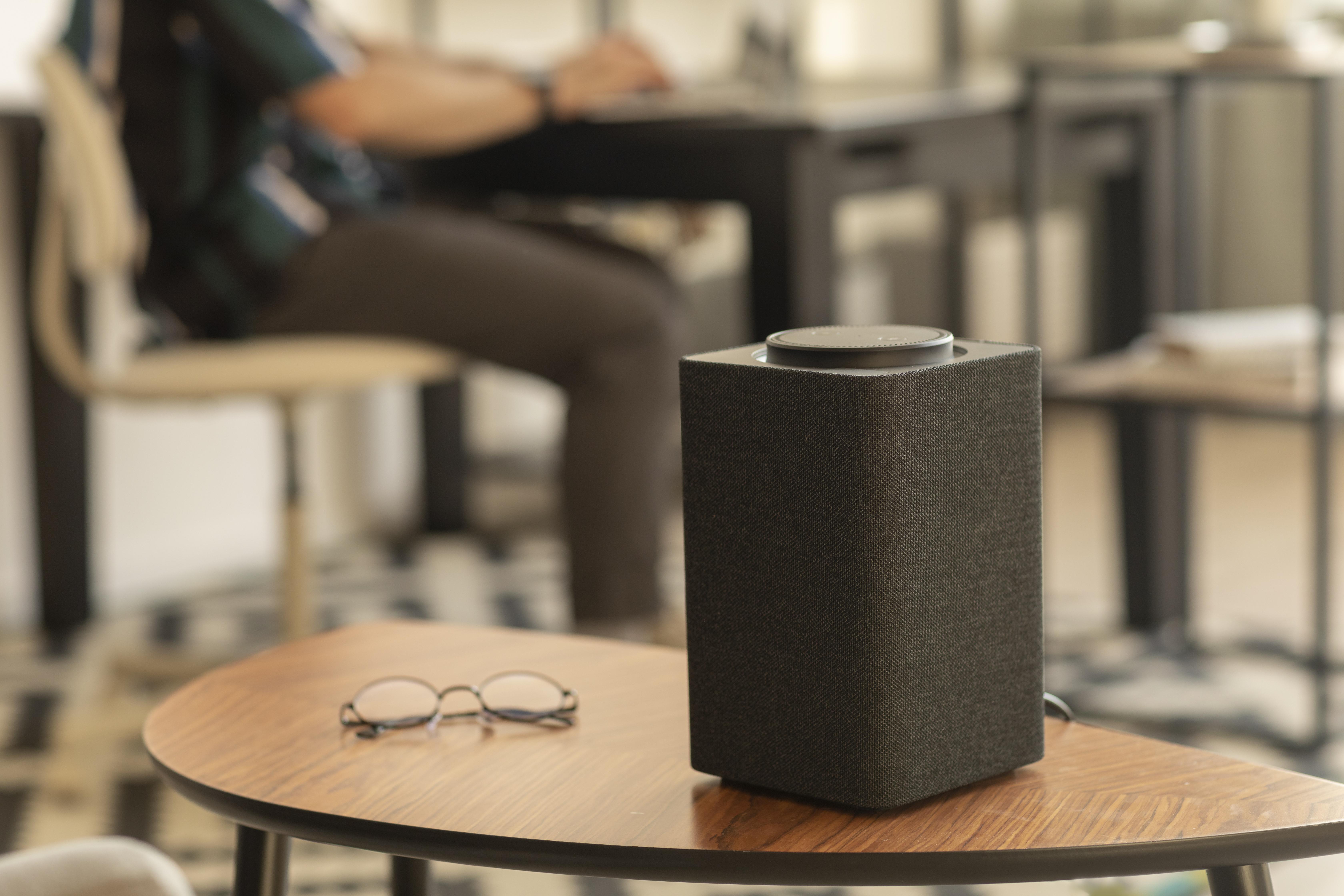 man-using-smart-speaker-while-working.jpg