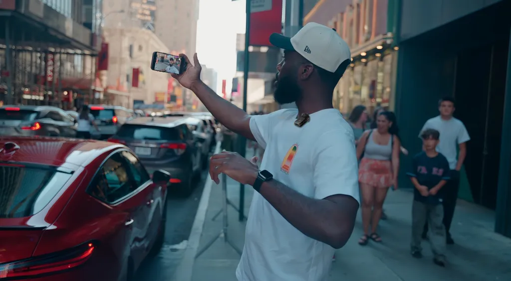 Figure 1: Content creator vlogging in an urban environment with a wireless clip-on microphone