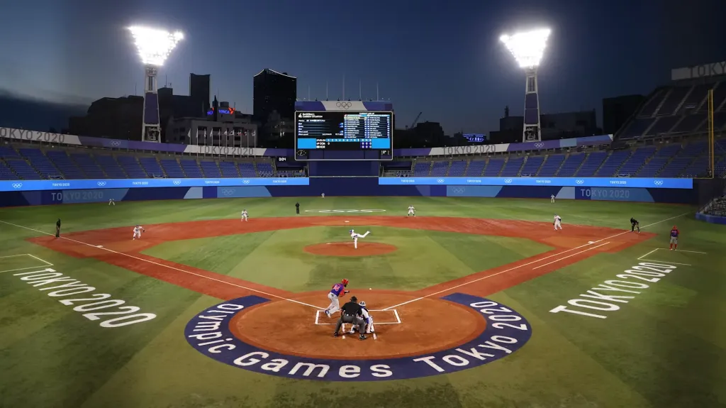 Youth baseball field under stadium lights ready for live streaming with multiple camera positions