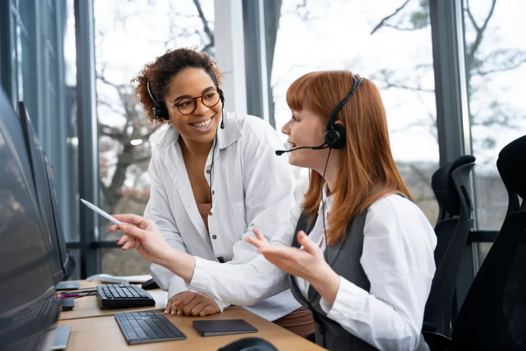 Bank call center agent wearing a headset with noise-cancelling microphone, assisting a customer efficiently over a voice call