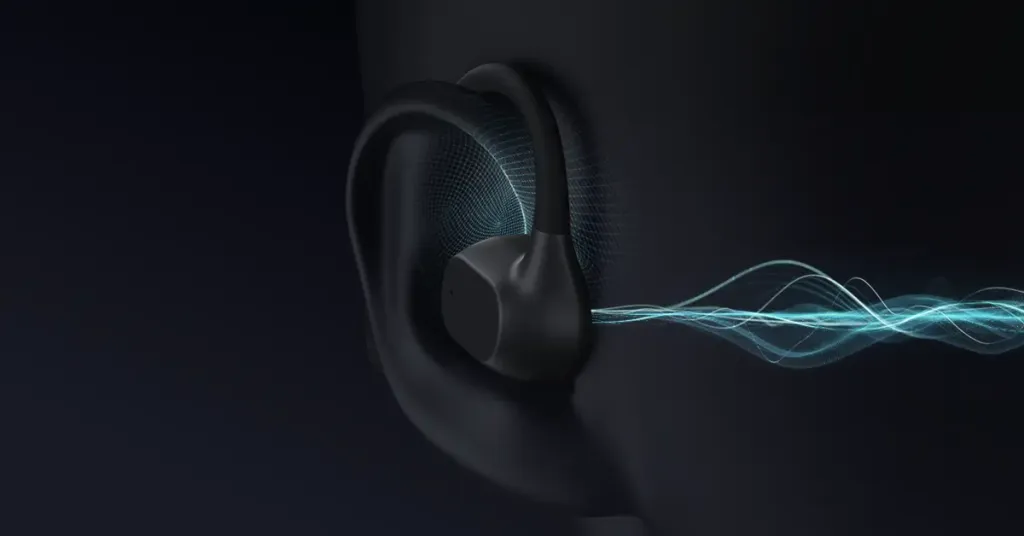 OpenEar Pro 2 headset demonstrating noise-cancelling technology, highlighting its microphone performance in noisy environments.