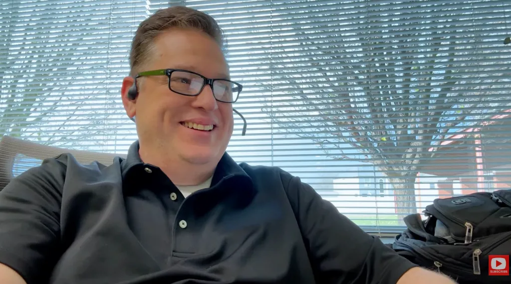 Andrew wears the OpenEar Pro2 in real office working scenarios.
