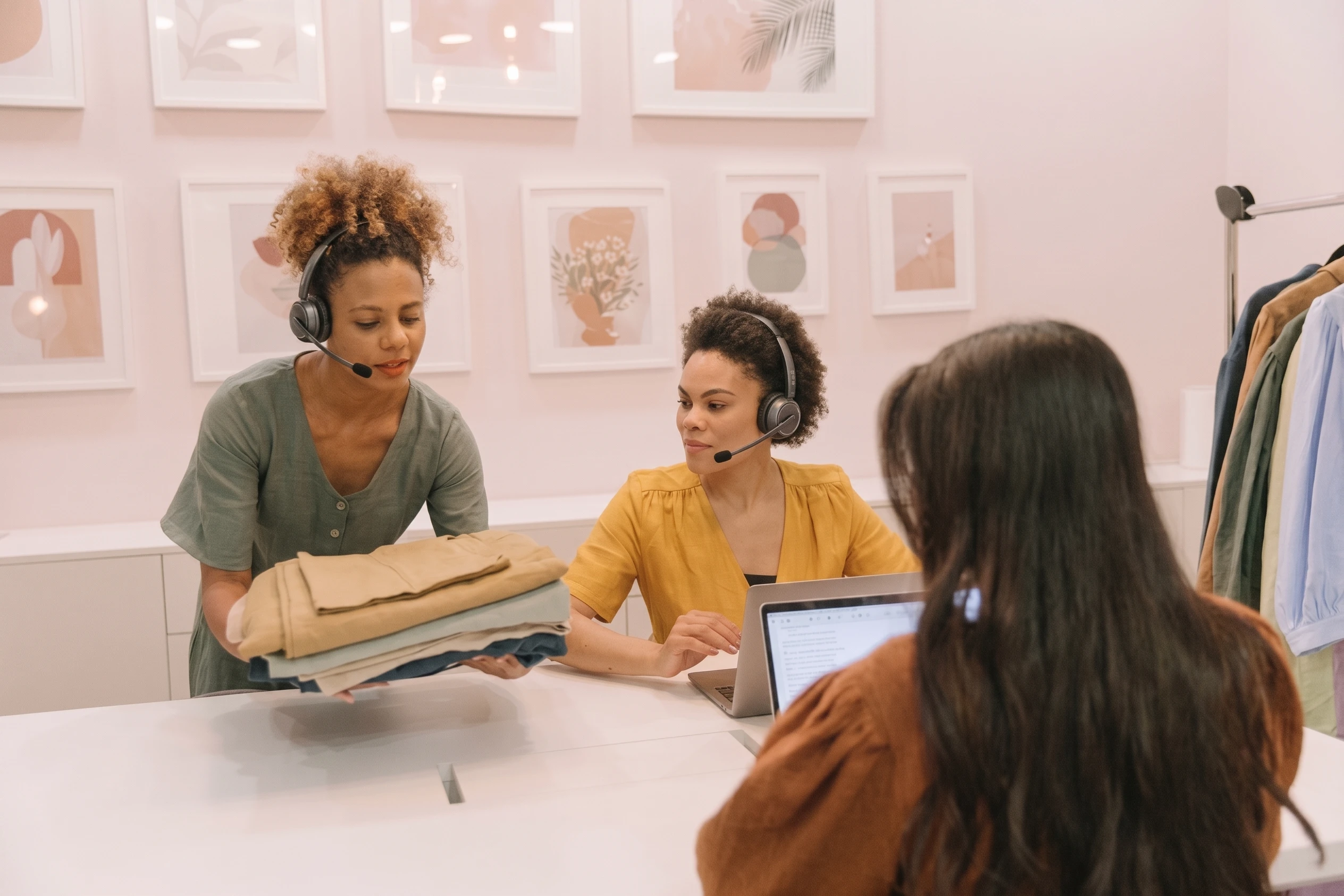 Customer service desk employee multitasking with a single ear headset