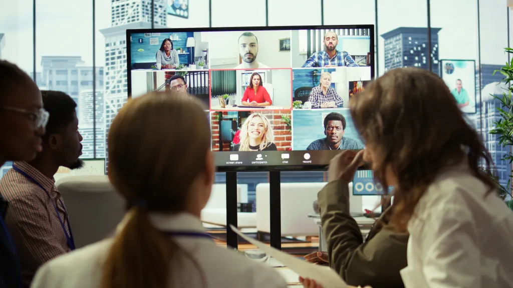 this team is holding a meeting using video conference headset