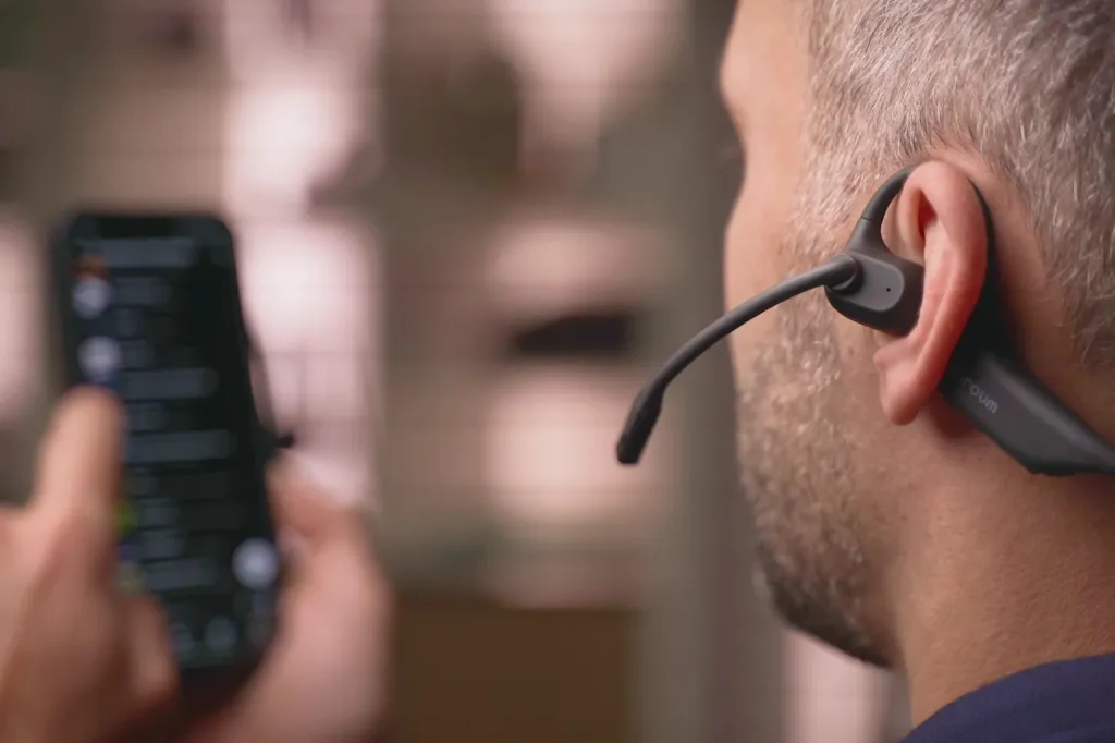 it is a question over bone conduction vs open ear headphones