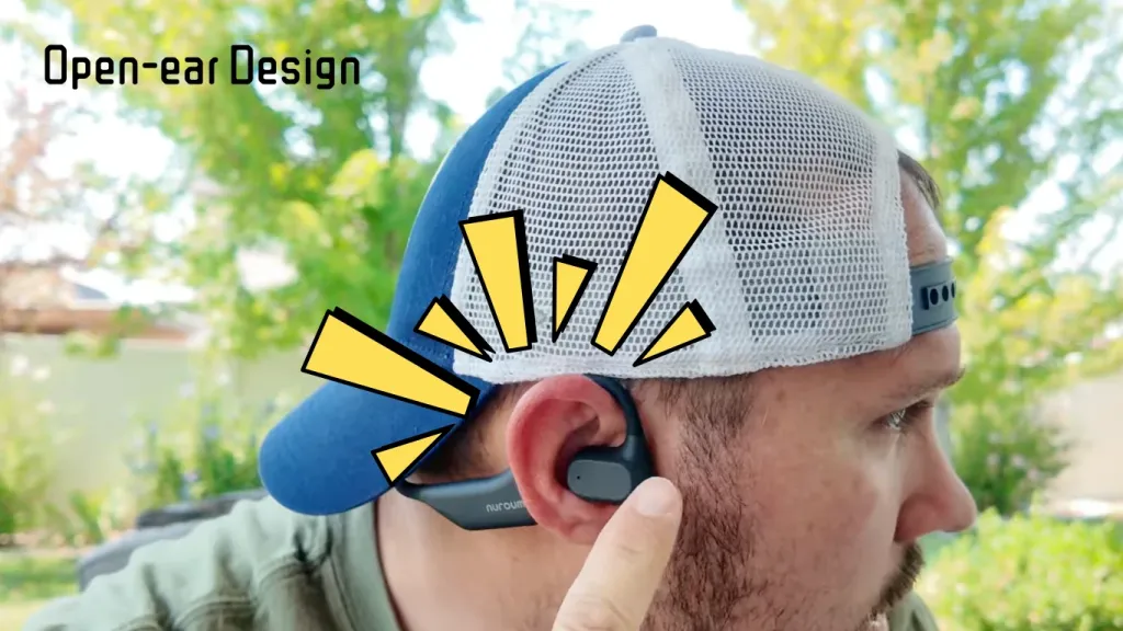 Side profile highlighting the ergonomic open-ear design and ear-hook fit of the Nuroum headset.