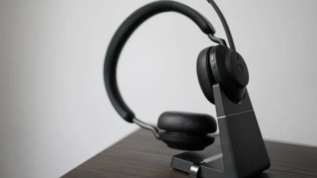 A wireless call center headphones on the desk.