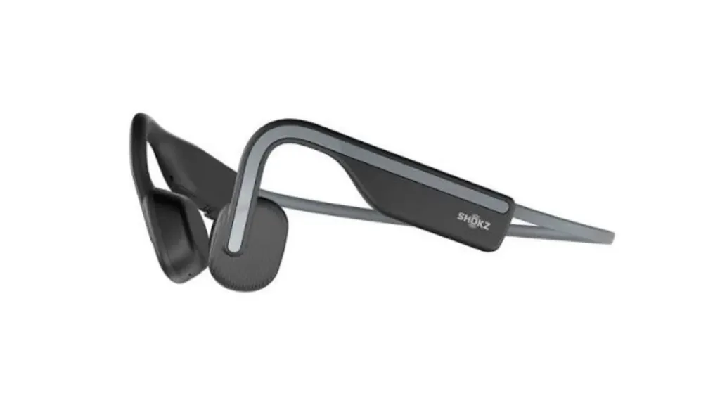 Side profile of two-tone grey and black Shokz open-ear bone conduction sports headphones.