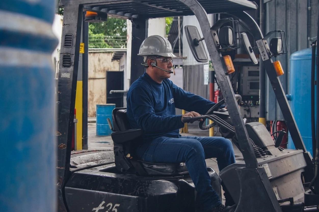 Logistics coordinator tracking inventory while on a call